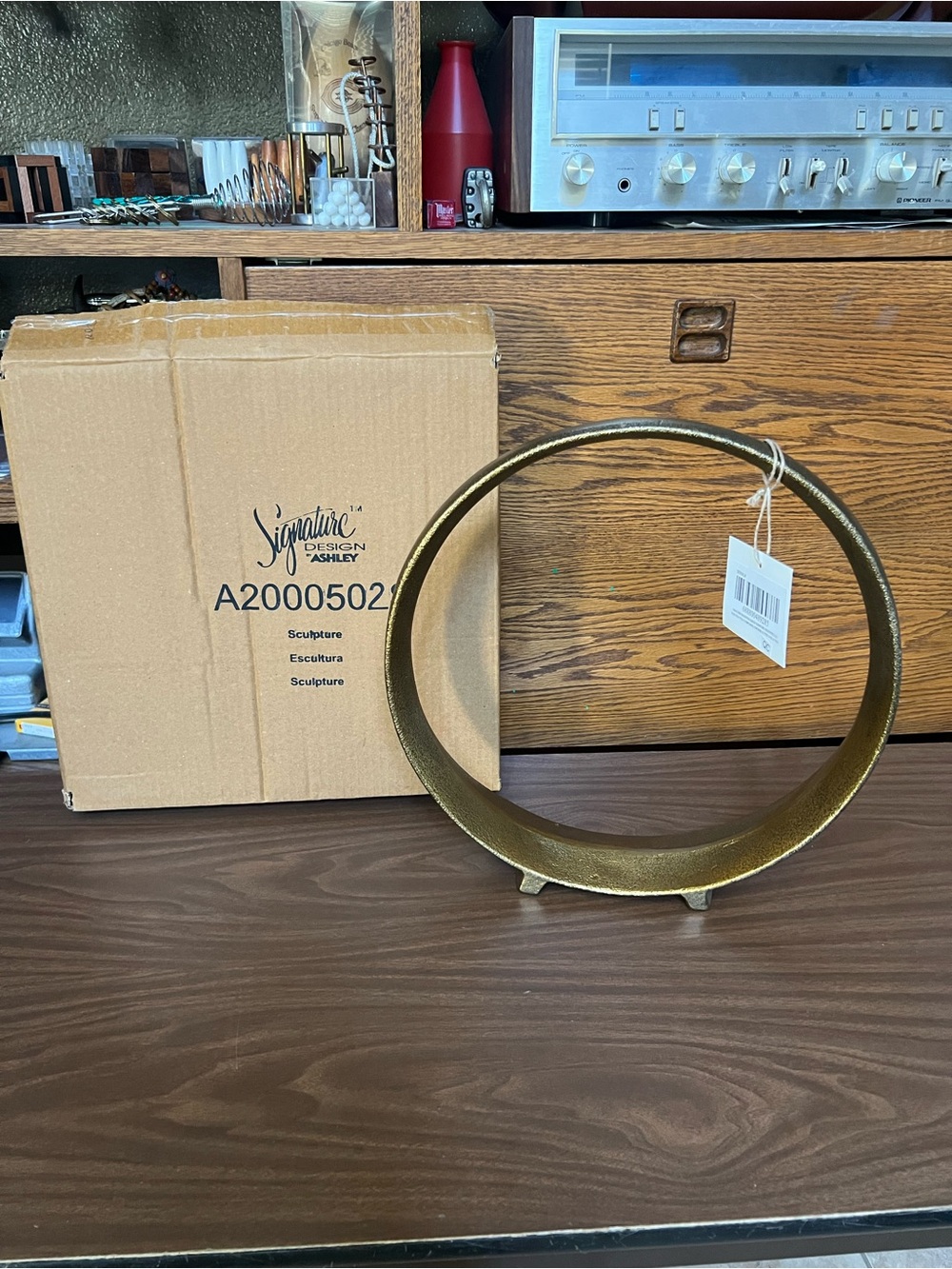Signature Design by Ashley Contemporary Ryandale Sculpture Antique Brass Finish